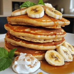 Pancakes à la Banane Sans Sucre are tasty banana pancakes without any added sugar. They use ripe bananas for sweetness, which makes them a healthy option. You get natural flavor and creaminess from the bananas. This recipe is simple and quick, perfect for busy mornings.