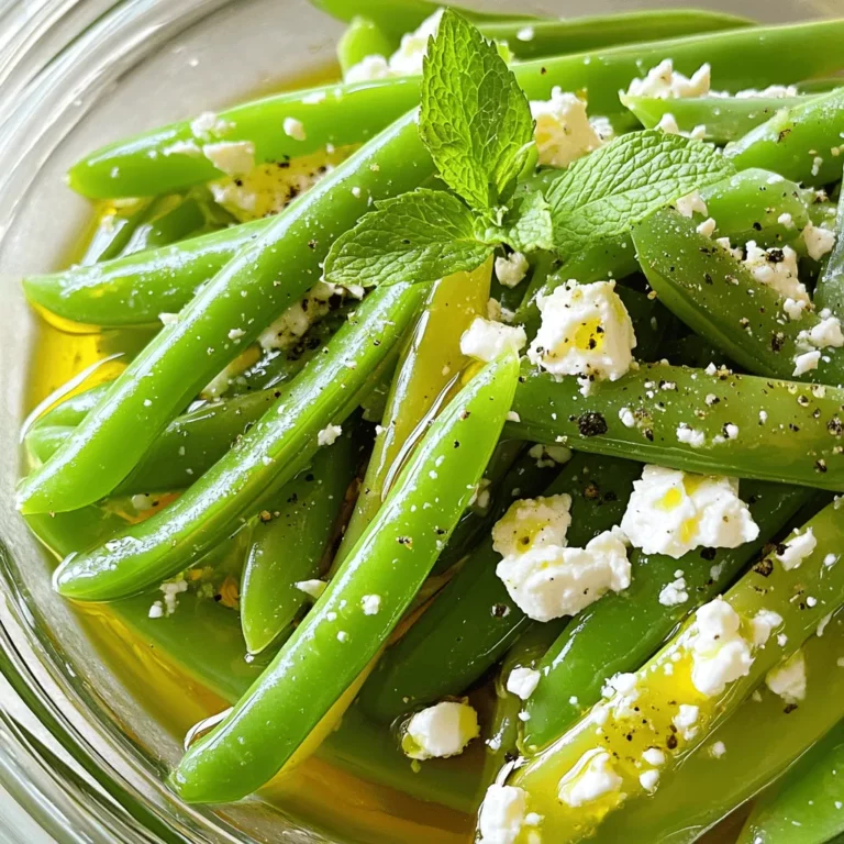 To make snap peas with feta, you need a few key ingredients. First, grab 2 cups of snap peas. They should be fresh and trimmed for the best taste. Feta cheese is also essential; you will use 1 cup of crumbled feta. This cheese adds a tangy flavor that pairs well with snap peas.